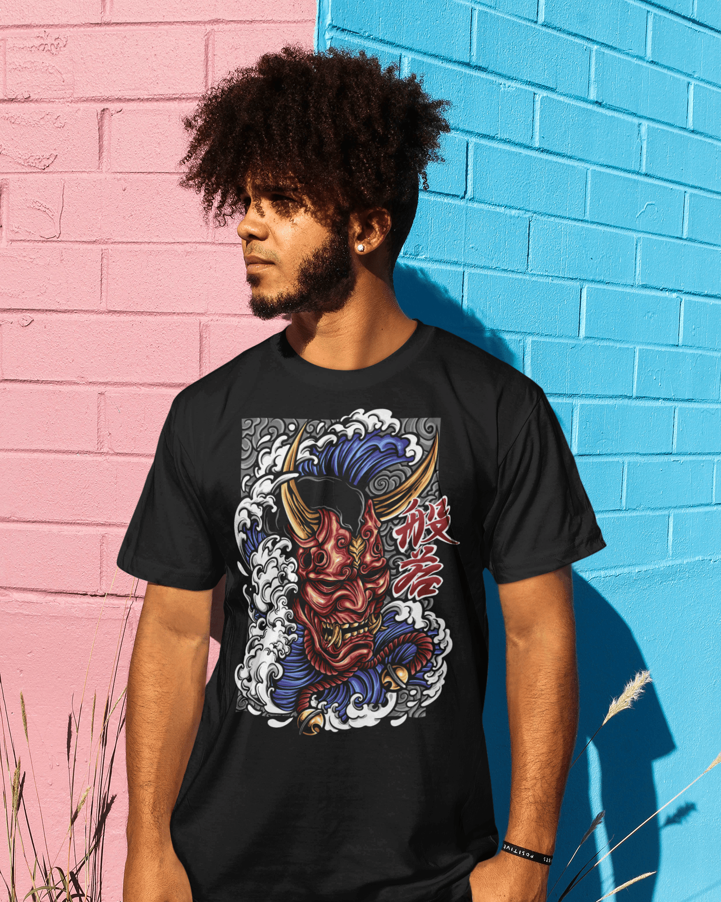 round-neck-t-shirt-mockup-featuring-a-man-leaning-on-a-wall-wearing-Hannya-mask-design