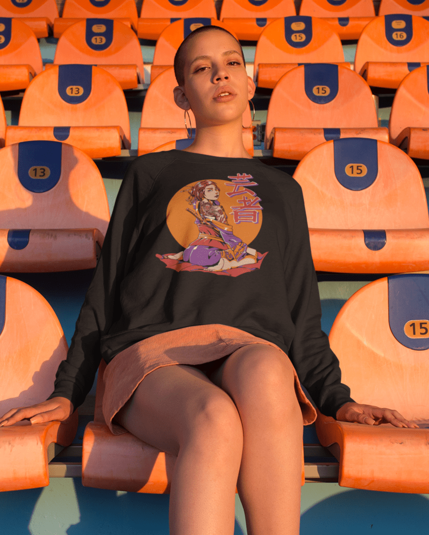 Kimono-tattoo-mockup-of-a-shaved-head-woman-wearing-a-crewneck-sweatshirt-sitting-at-a-stadium-TeeStitch-Apparel