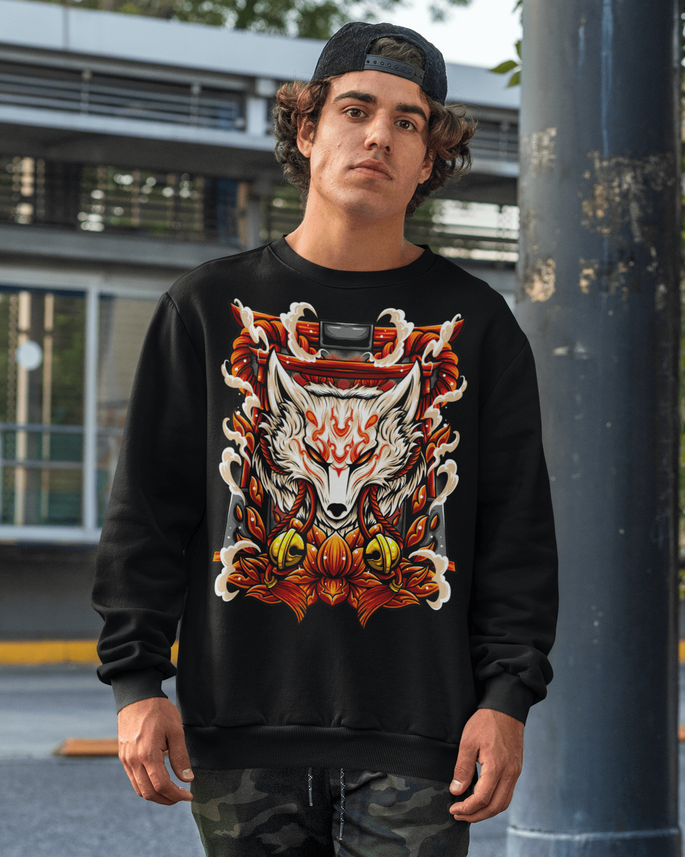 Kitsune-designed-mockup-of-a-young-man-wearing-a-sweatshirt-in-an-urban-scenario-TeeStitch-Apparel