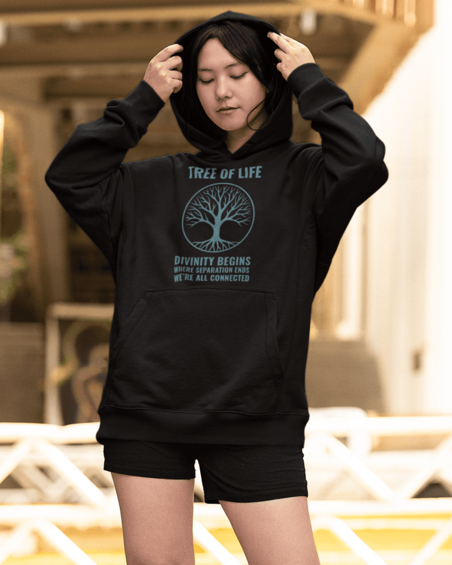 tree-of-life-mockup-of-a-young-woman-wearing-an-oversized-hoodie-in-the-city