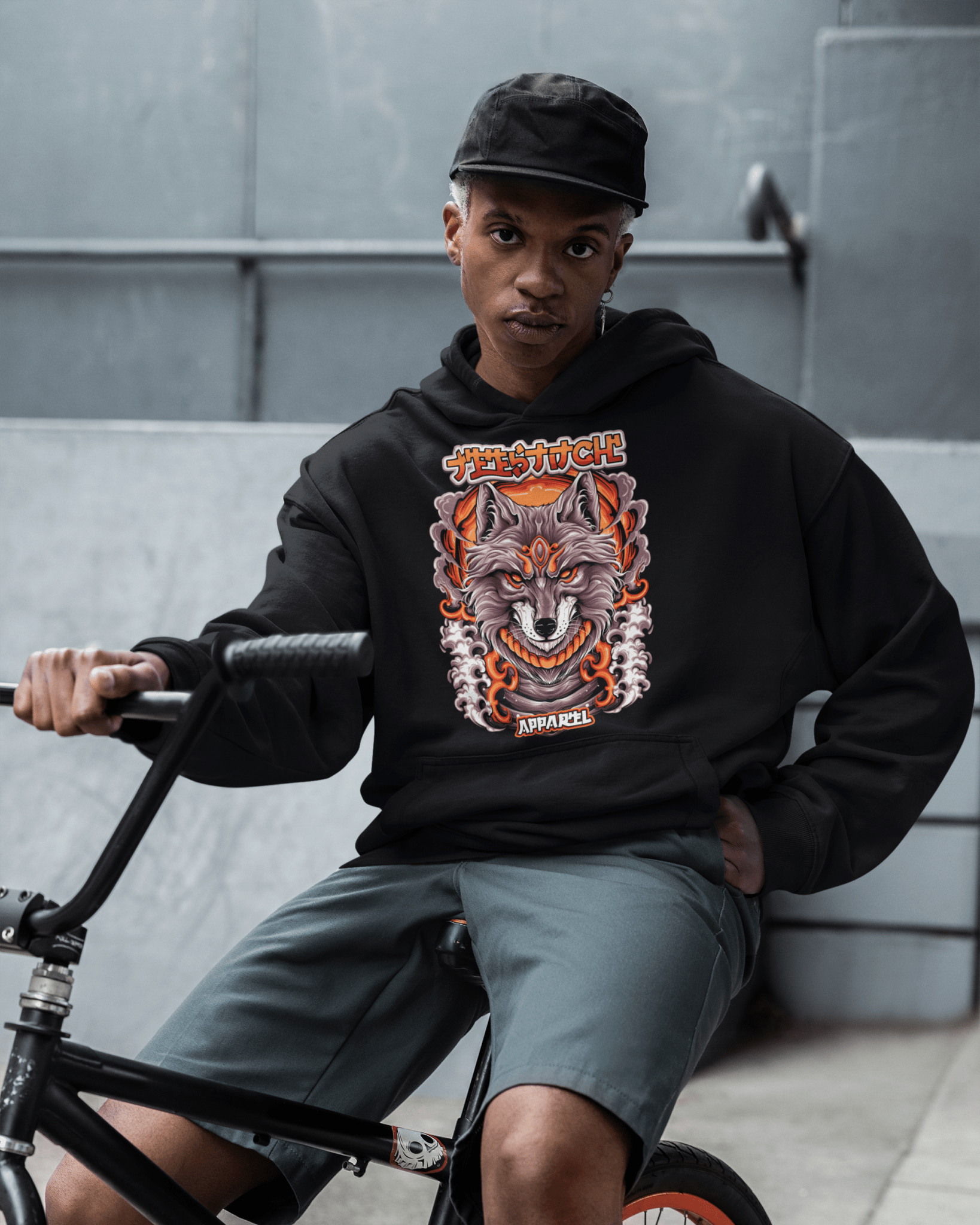 Wolfwave-designed-pullover-hoodie-mockup-of-a-man-riding-a-bike-TeeStitch-Apparel