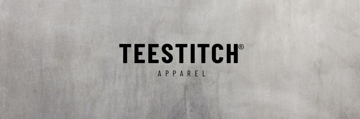 TeeStitch Apparel  Brand name on a concrete wall