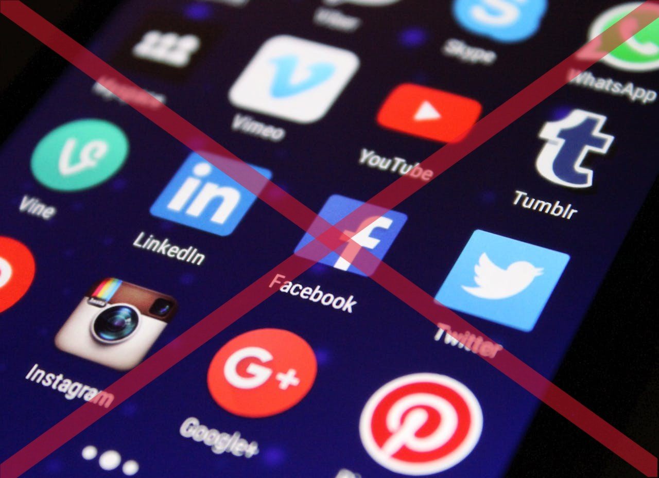 Social media app icons crossed out.