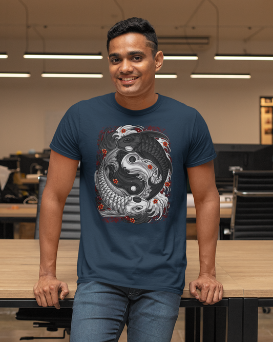 Man wearing a blue t-shirt with a yin yang koi fish design in an office setting