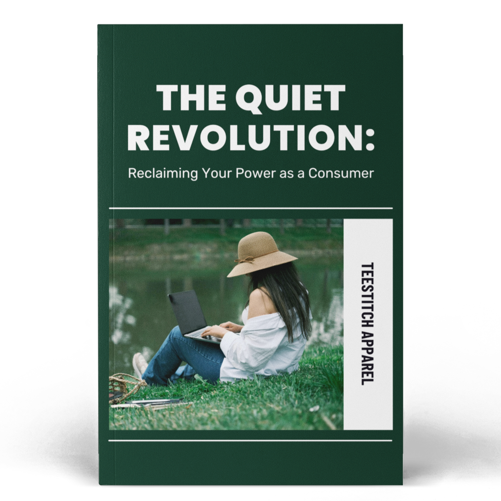 A book cover titled 'THE QUIET REVOLUTION: Reclaiming Your Power as a Consumer' by Teestitch Apparel, featuring a dark green background with white text and a central photo of a woman sitting on grass by a lake.