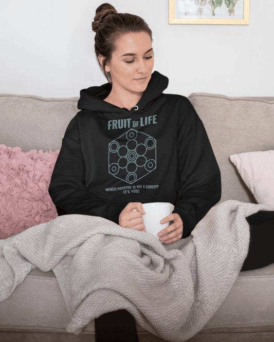 fruit-of-life-hoodie-mockup-featuring-a-beautiful-woman-on-her-sofa