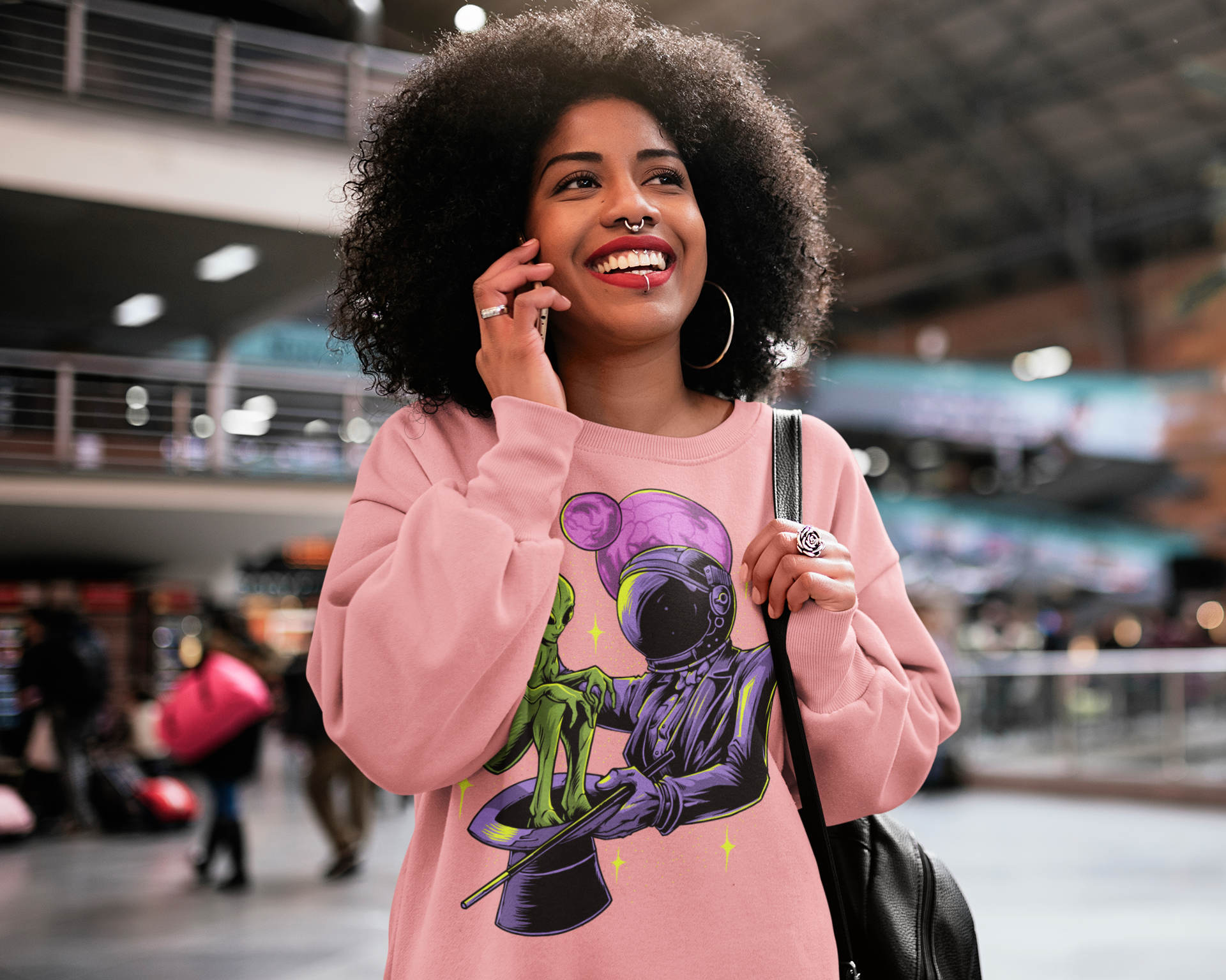 woman-with-a-rounded-neck-sweatshirt-talking-on-her-smartphone