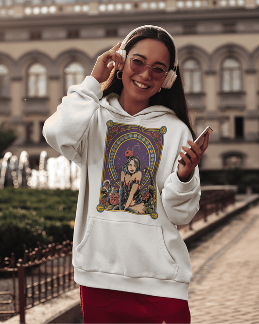 woman with headphones wearing a Scorpio designed Unisex Hoodie || TeeStitch Apparel
