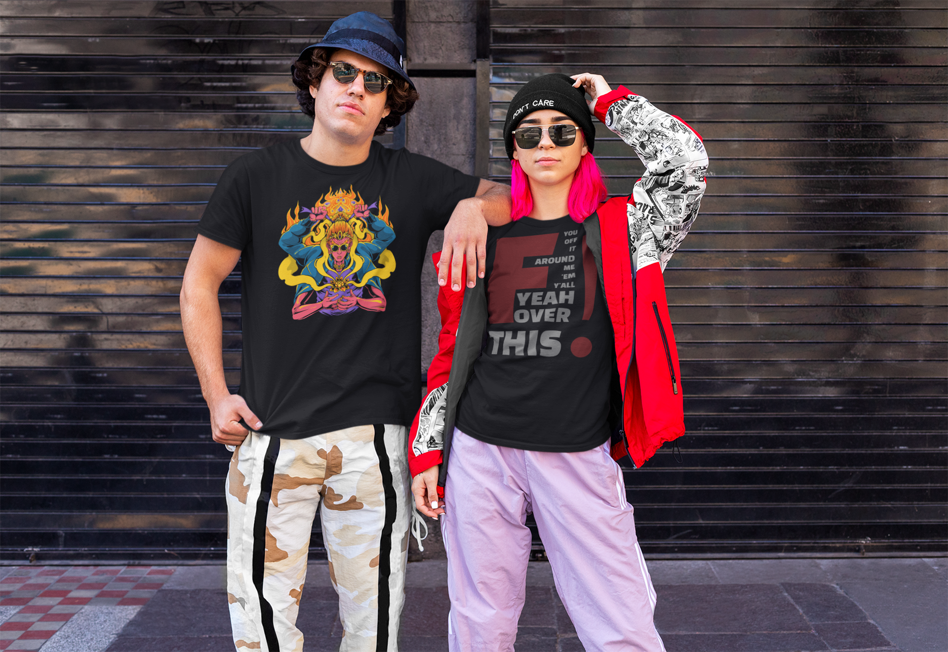 Two people wearing stylish outfits with graphic tees and colorful accessories against a dark wooden background.